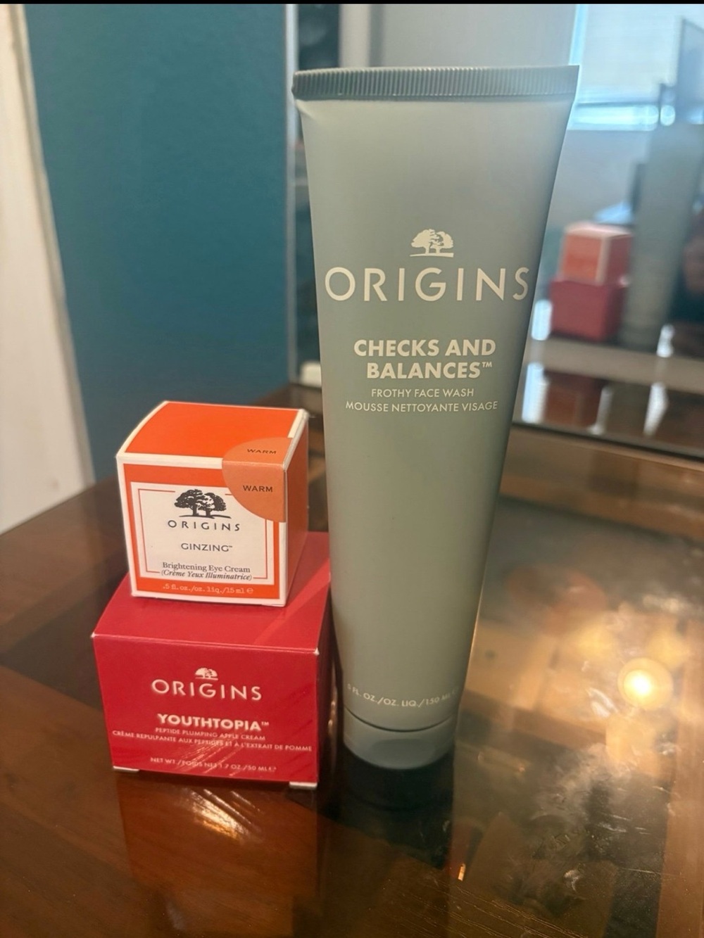 Origins Checks and Balances Face Wash with Red and Orange Boxes